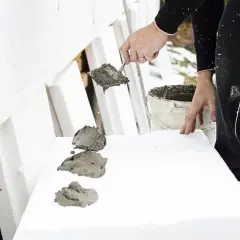 Co wchodzi w skład elewacji budynku? Kluczowe elementy i materiały